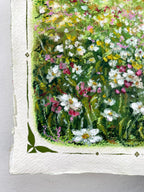 Close-up of an oil pastel painting on textured paper, showing a dense field of white, pink, yellow, and green wildflowers with a decorative white border and green corner accents.