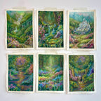 Gallery wall of six whimsical mini original oil pastel paintings featuring fairytale forests, waterfalls, castles, rivers, lush foliage, and colourful magical woodland scenery.
