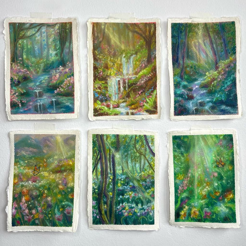 Six whimsical mini oil pastel paintings displayed as a gallery wall featuring magical forests, waterfalls, butterflies, rivers, glowing light, and vibrant wildflower scenery