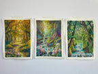 Three whimsical forest themed artworks displayed side-by-side, inspired by autumn, spring, and summer with glowing rivers, waterfalls, sunlight, trees, and wildflowers.