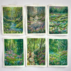 Gallery wall of six mini original oil pastel woodland paintings featuring sparkling rivers and streams, glowing light, trees, and colourful wildflower landscapes.