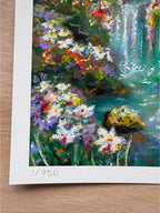 Close-up detail of numbered limited edition print featuring white wildflowers, grasses, rocky riverbank, and layered oil pastel texture in magical forest scene.