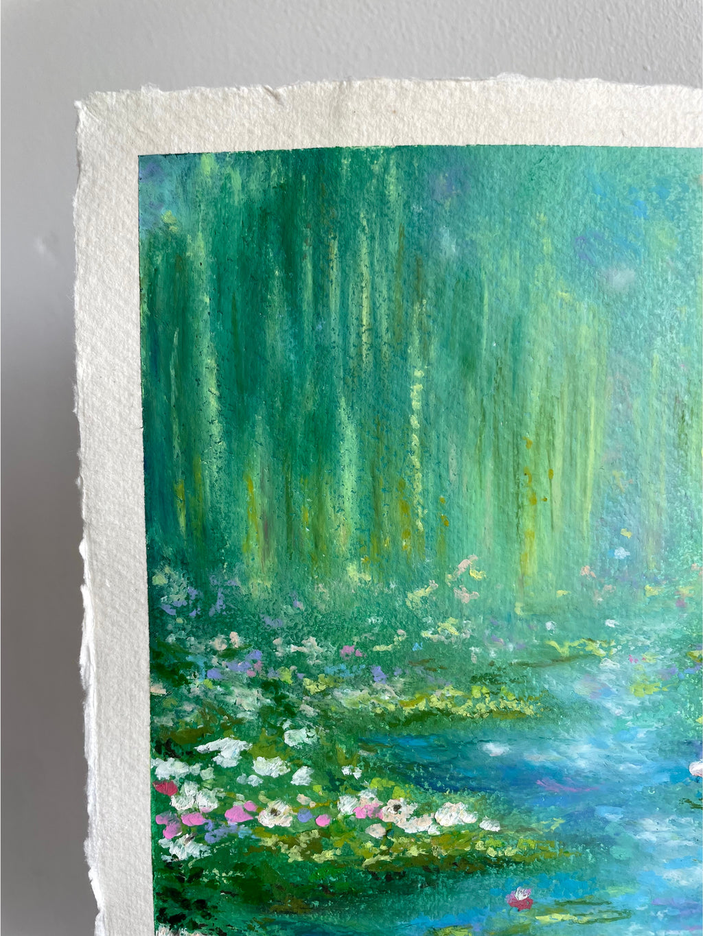 Close-up of soft weeping willow trees and wildflowers in a magical impressionist oil pastel landscape, featuring hazy sunlight, airy green tones and whimsical countryside details.