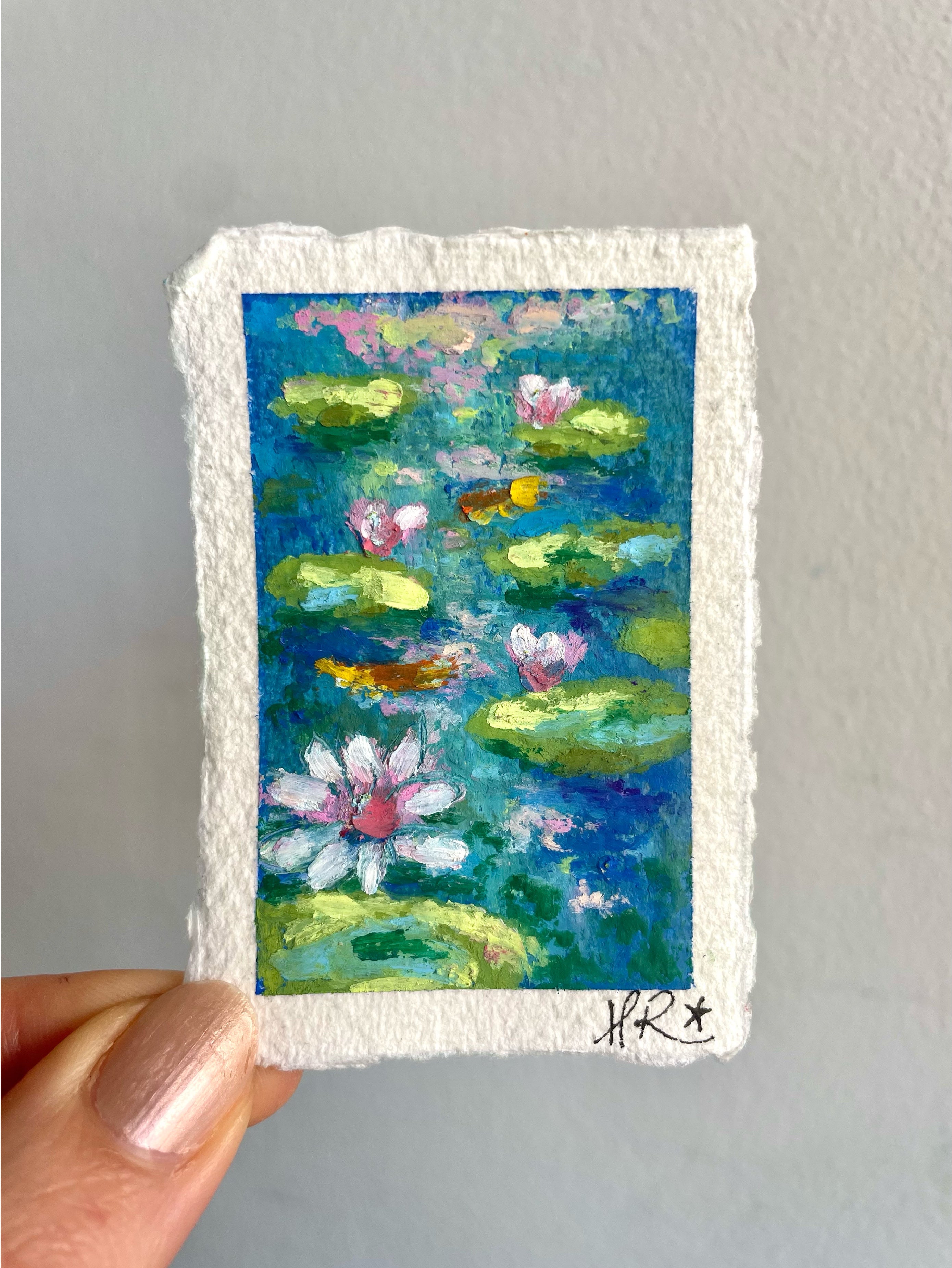 Magical mini oil pastel pond painting featuring sparkling sunlight, lily pads, water lilies, and subtle hints of koi fish in a dreamy impressionist style.