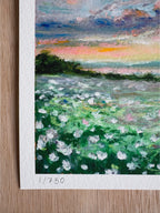 Close-up detail of numbered limited edition sunset landscape print featuring layered wildflowers, grasses, and hints of glowing sky and lake.