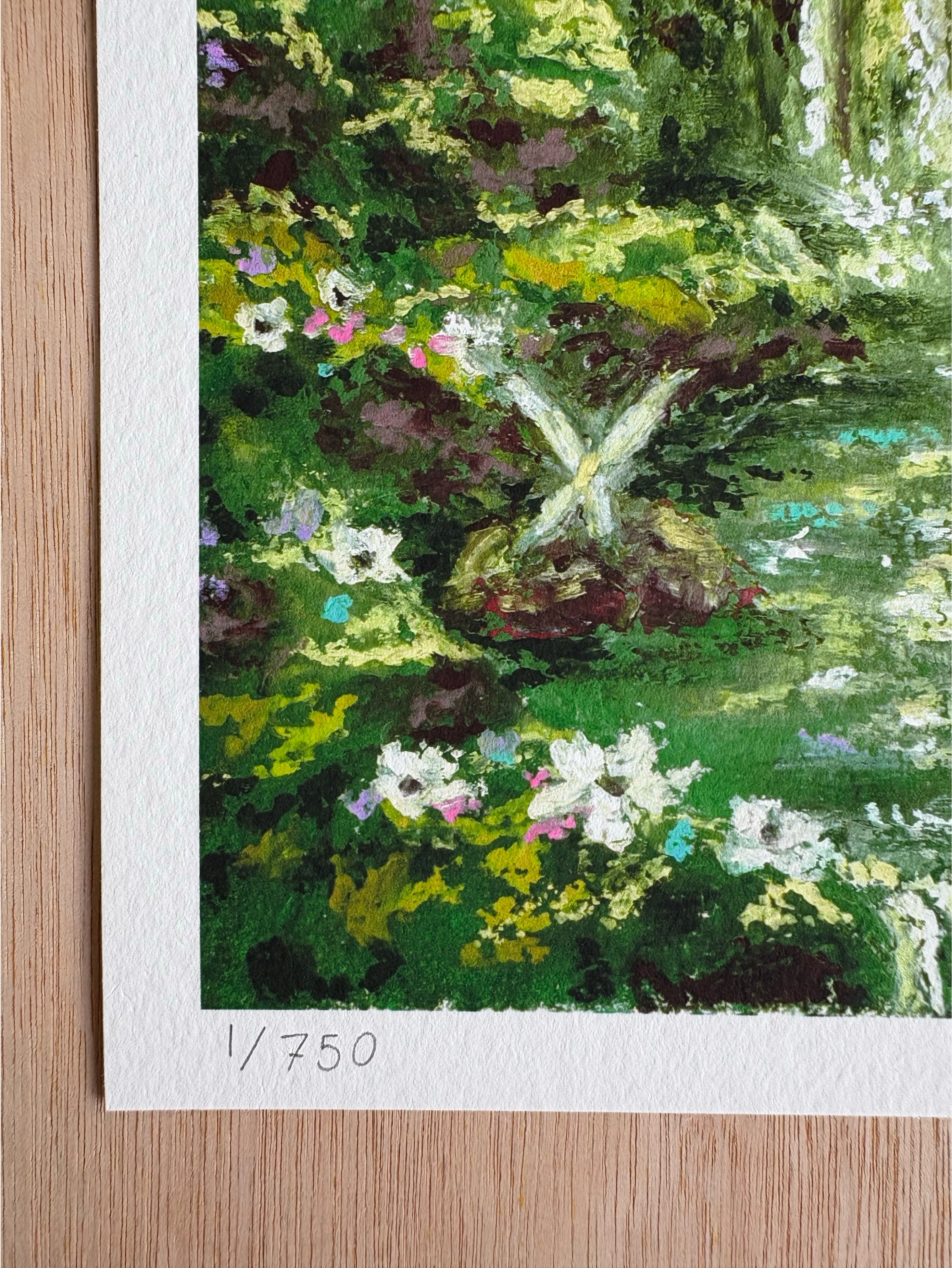 Close-up detail of numbered whimsical forest print featuring moss-covered rocks, wildflowers, flowing river, and tiny fairy figure inspired by Celtic folklore.