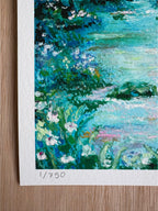 Close-up detail of numbered limited edition forest print featuring wildflowers, river rocks, and layered oil pastel texture in glowing midnight landscape.